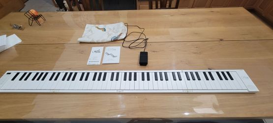 88 KEY Foldable Piano. Carry On folding piano 88.