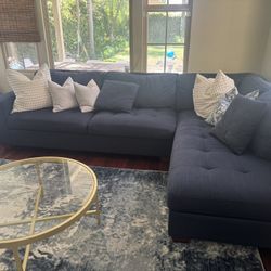 L-Shaped Blue Sofa with Rug & Round Table – Great Condition