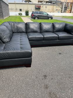 Sectional black leather sofa