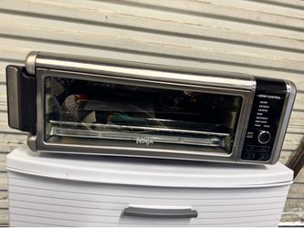 Ninja Foodi 8-in-1 Digital Air Fry Oven (specifically the SP101 model series featuring "Digital Crisp Control").