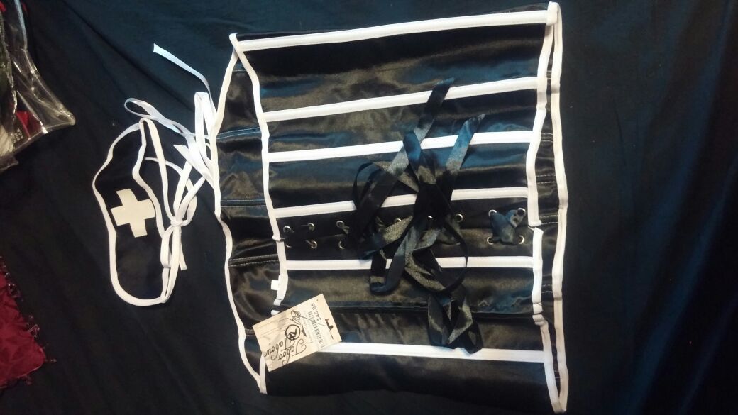 Black/white nurse corset and headpiece. Brand new never worn. Size XL fits like M/L. Bought from Taboo Taboo.