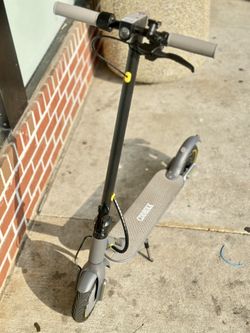 Electric scooter with charger/Tires Can’t Flat $220