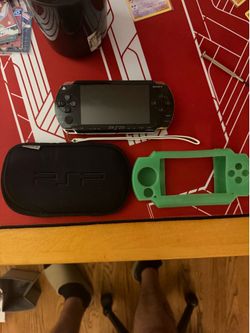 PSP with rubber case and sleeve