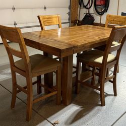 Rustic, farmhouse-style dining table & 5 upholstered chairs