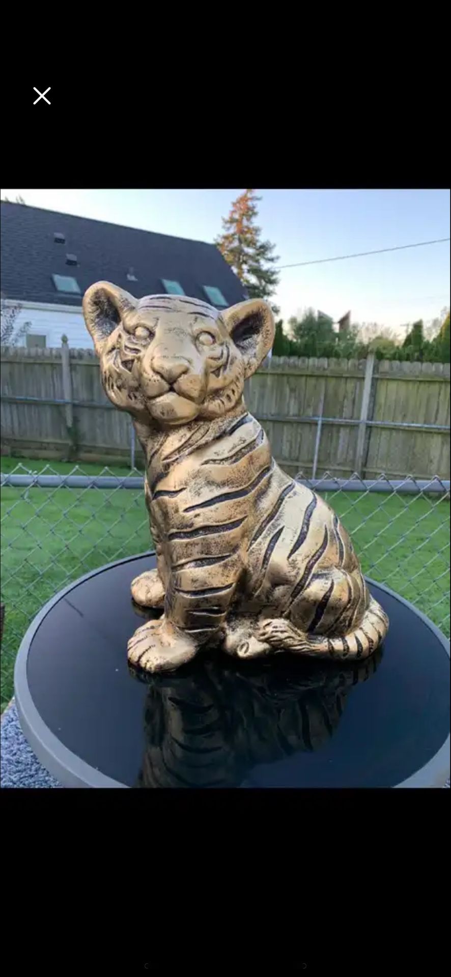 Golden tiger, cub statue