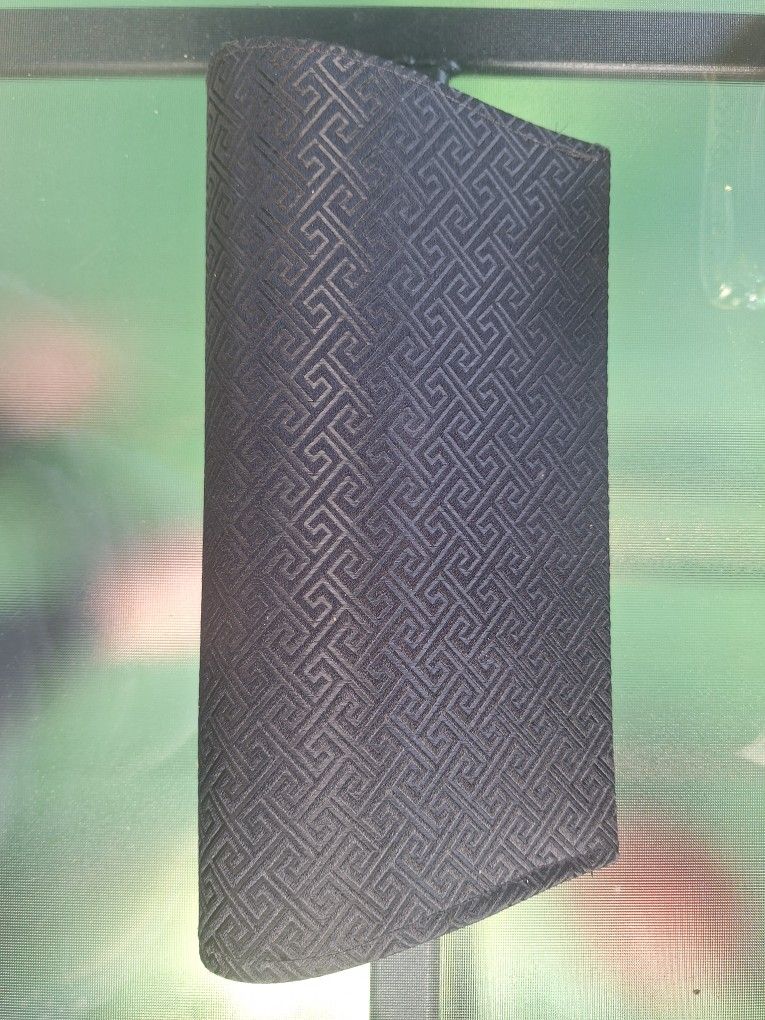 Elegant Black Clutch Bag with Geometric Pattern
