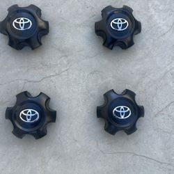 4/OEM Toyota center caps