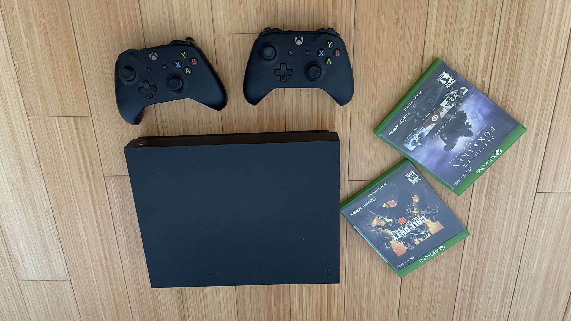 Xbox One X 1TB (2017) + Controllers, Games & Headset – Like New