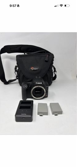 Canon EOS Rebel XS 10.1MP DSLR Camera Only Body DS126191 W/Bag,Batteries,Charger