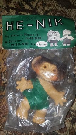1960's He-Nik Troll Doll by Undeea. As new condition in original packaging. 6" tall. There are a couple of small holes in the plastic