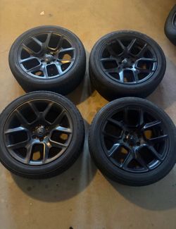 Set 4 oem ram 1500 night edition 22inch rims