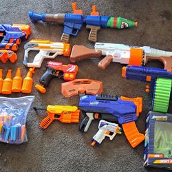 Nerf Guns With One Water Gun, 2 Attachments, And Lots Of Bullets