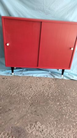 Awesome piece!!! Refurbished red wooden two door storage cabinet ..