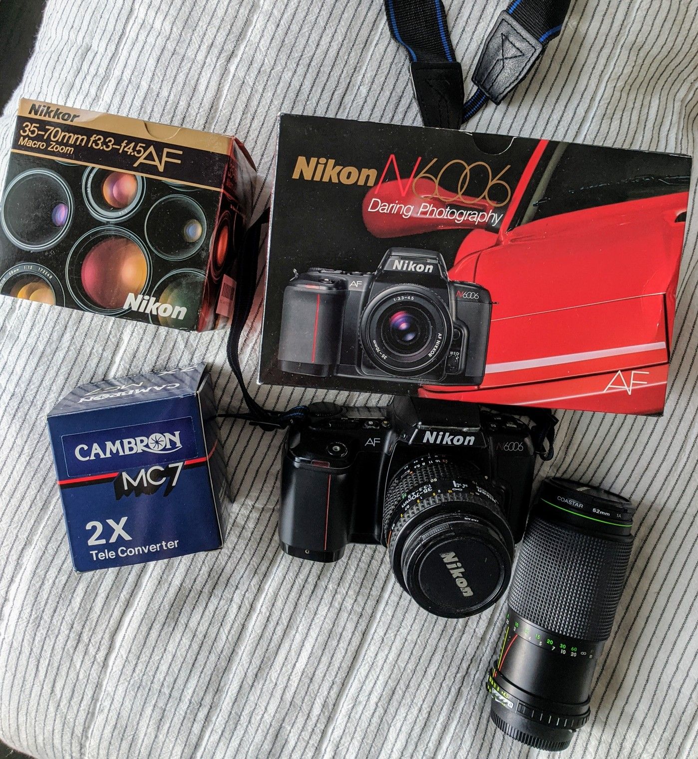 Nikon 6006 camera, 2 lenses, 1 telephoto adaptor, bag, filter