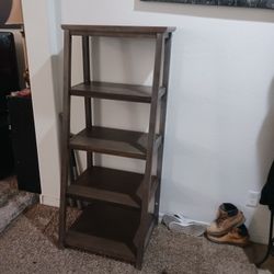 Beautiful Brand New 5 tier Ladder Shelf sturdy not a mark on it perfect condition sking only $85 cash Paid $150 must pick up Broadway and apache bucke