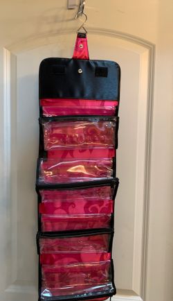 Mary Kay travel roll-up organizer.