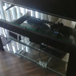 Corner glass TV stand