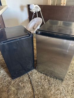 Two Mini Fridges — Black and Stainless Steel