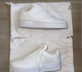 Louis Vuitton triple white Air Force ones