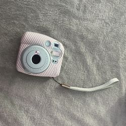 instax teal camera with cover