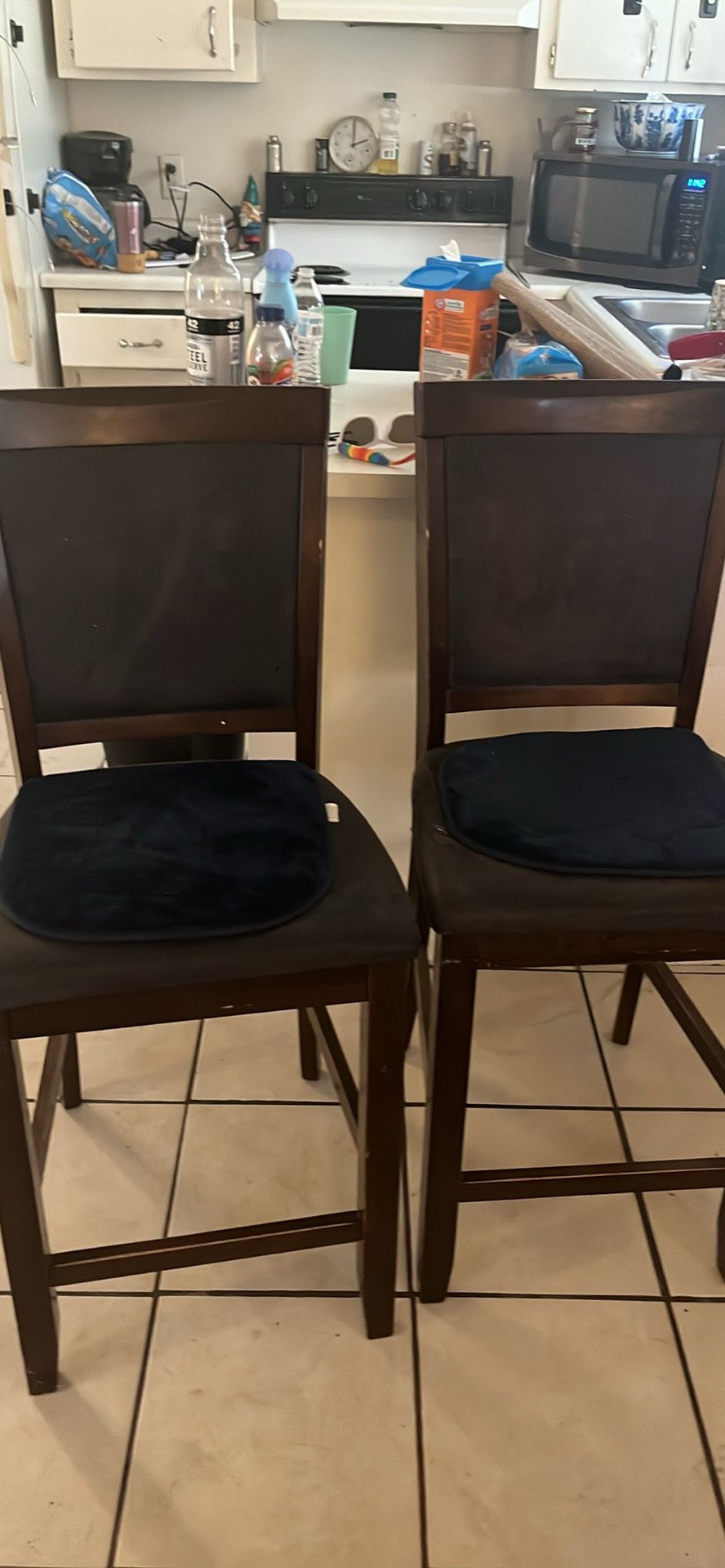 Two Barstool Height Chairs