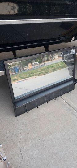Mirror with metal frame