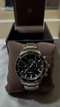 Bulova watch w original price tag and extra links