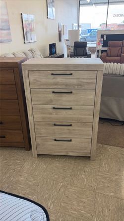 New Ashley Furniture chest of drawers