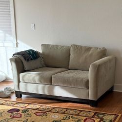 Macy’s light sage colored Loveseat