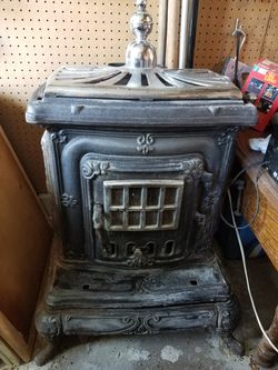 Antique wood burning parlor stove for Sale in Saint Paul, MN - OfferUp
