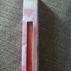NEW Winky Lux Disco Gloss Ph Lip Gloss Color Changing - Hustle
Applies Pink
