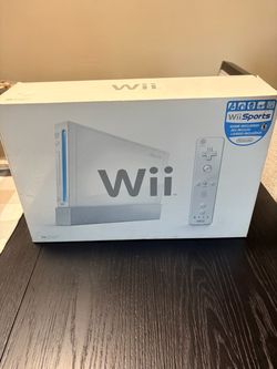 Wii console plus assorted games