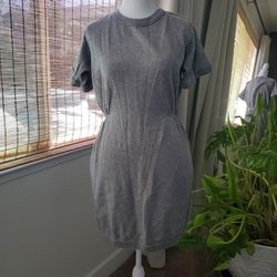 Small women's grey knitted sweater dress