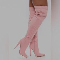 Pink thigh high heeled boots
