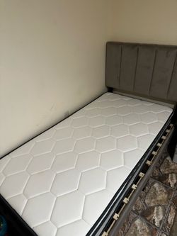 Twin beds with mattress