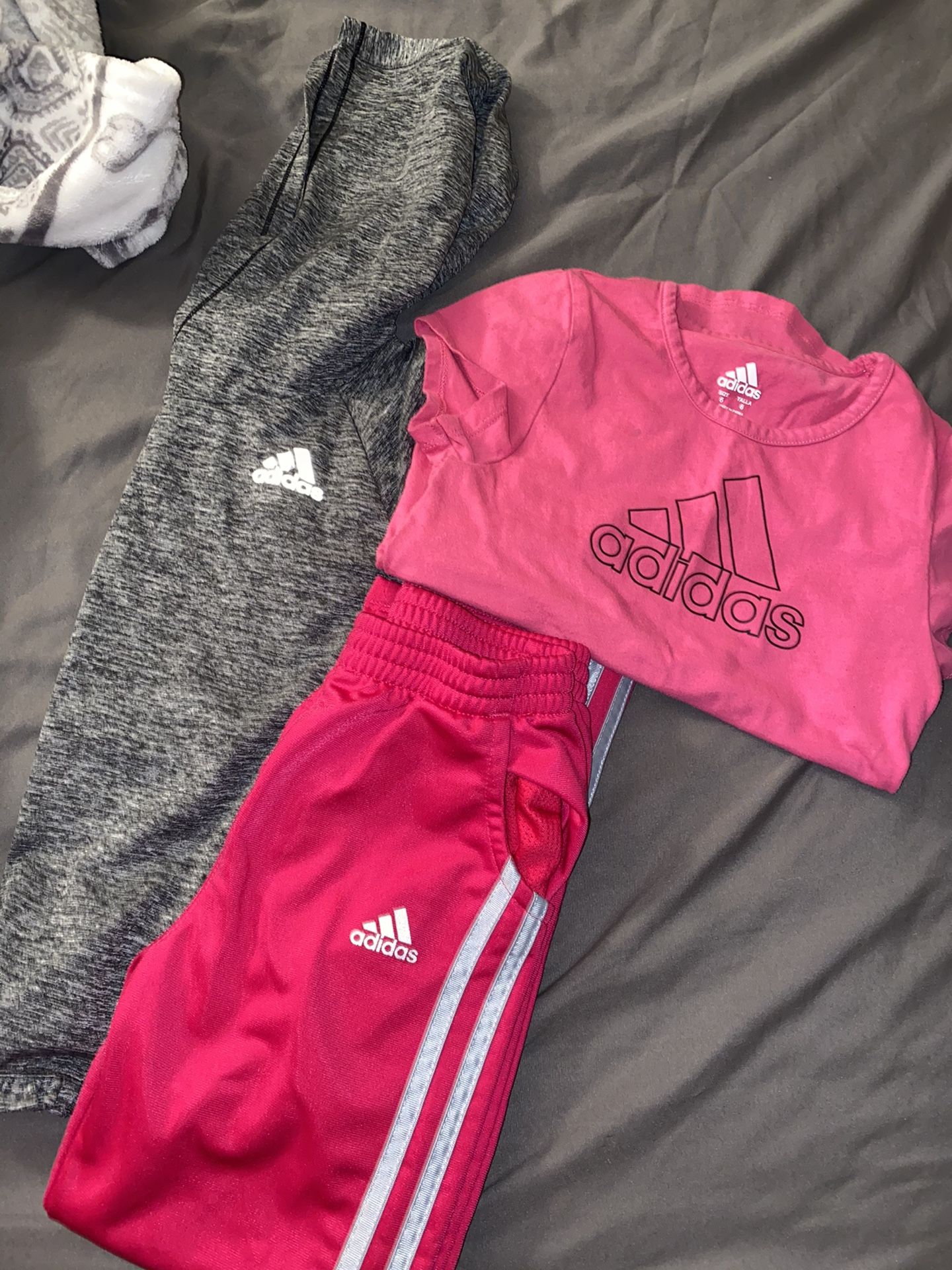 Adidas size 6 lot small stain on pink shirt shown