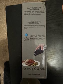 Gravity salt and pepper mill