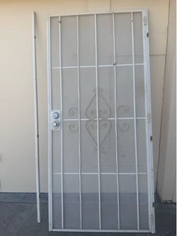 Beige security gate 36” by 80”