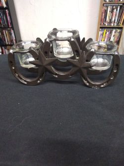 Horseshoe candle holder