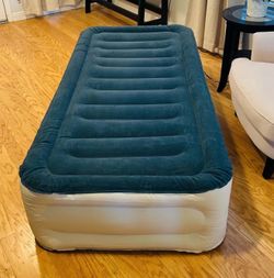 Brand new in box never opened twin air mattress with built in pump
