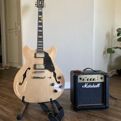 Hollow Body Guitar And Marshall Amp