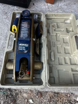 Title: ACDelco 2.5 Ton Rapid Jack Trolley Jack with Case  Description: Used ACDelco 2-1/2 ton rapid jack trolley jack. Comes with carrying/storage cas