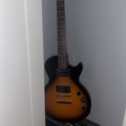 6 String Electric Guitar And Amp