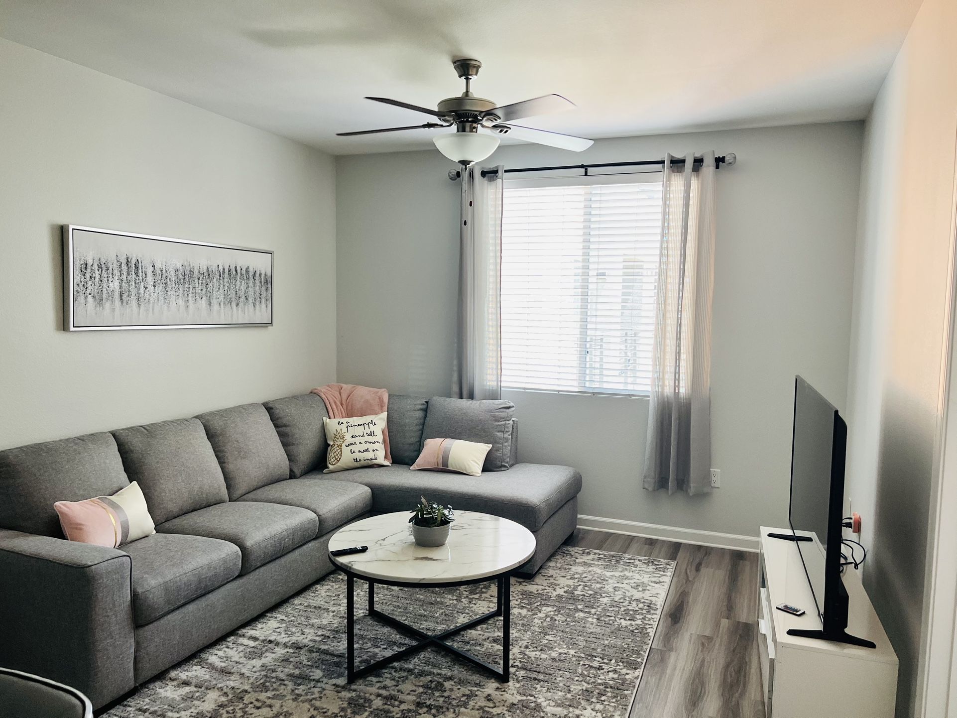 Comfortable Gray Sectional and Coffee Table