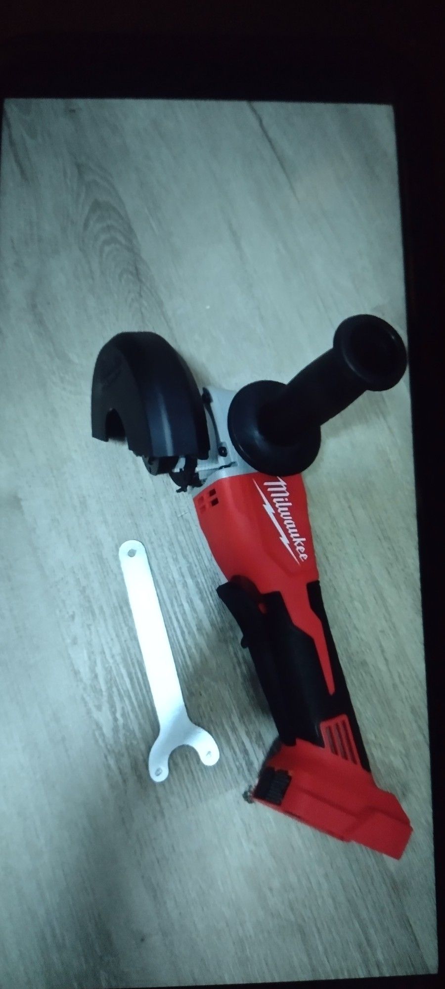 Milwaukee m18 brushless cordless 4-1/2' to 5' in. grinder with paddle Smith 18v tool only new