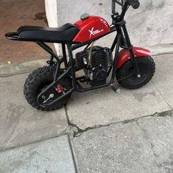 49cc Mini bike (gas fills with around $1)