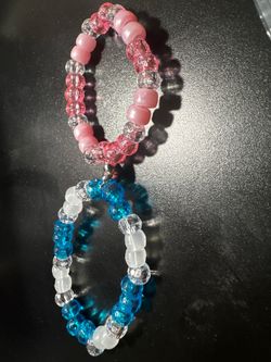 Custom Rosaries, Bracelets, Anklets, Earrings, key chains, rings, coasters, and phone charms..