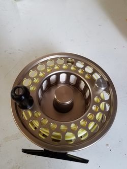 Gold cup fly reel