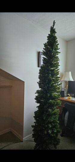 8.5ft Pencil Christmas Tree (partially lit, bulb out only)