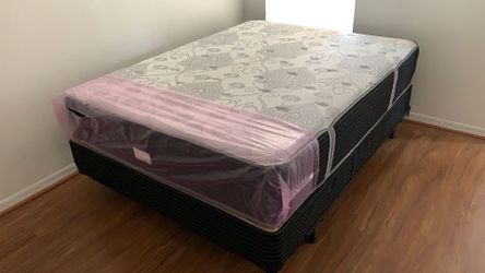 New queen mattress and box spring 2 pc bed frame is not included